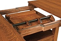 #25895: Bassett Cabinet Table shown --- Self-storing butterfly leaf